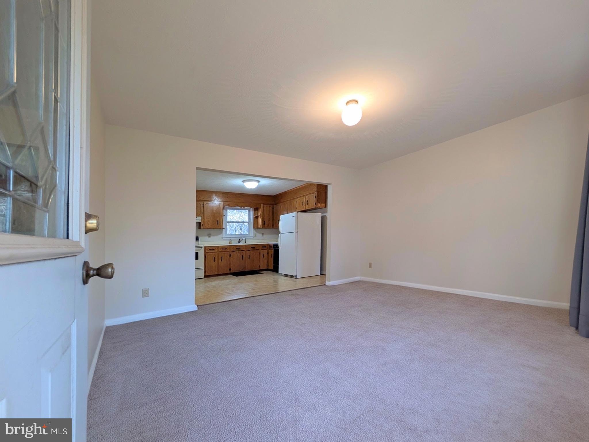 271 Rambling Road Ruckersville, VA 22968 - Photo 5 of 26 Front entrance looking to living room and kitchen