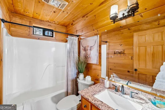 a view of balcony with wooden floor