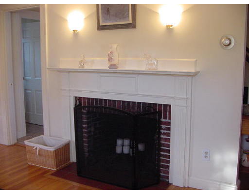 37 Taylor Road Belmont, MA 02478 - Photo 4 of 10 a close view of a sink and a fireplace in a bathroom