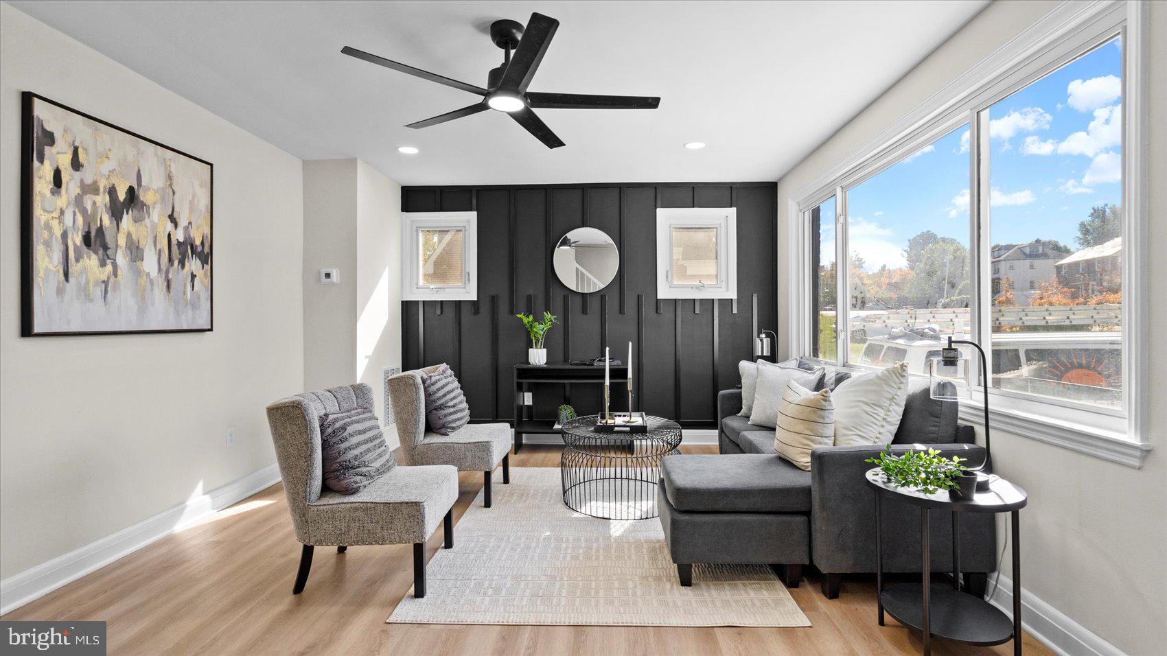 711 West Hills Road Baltimore, MD 21229 - Photo 5 of 52 a living room with furniture and a large window