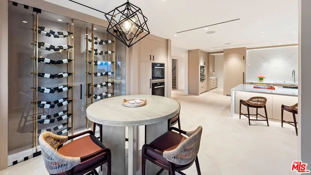 a kitchen with a sink and a stove