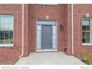 24292 Ravine Drive South Lyon, MI 48178 - Photo 2 of 23 Ravine front door.jpg