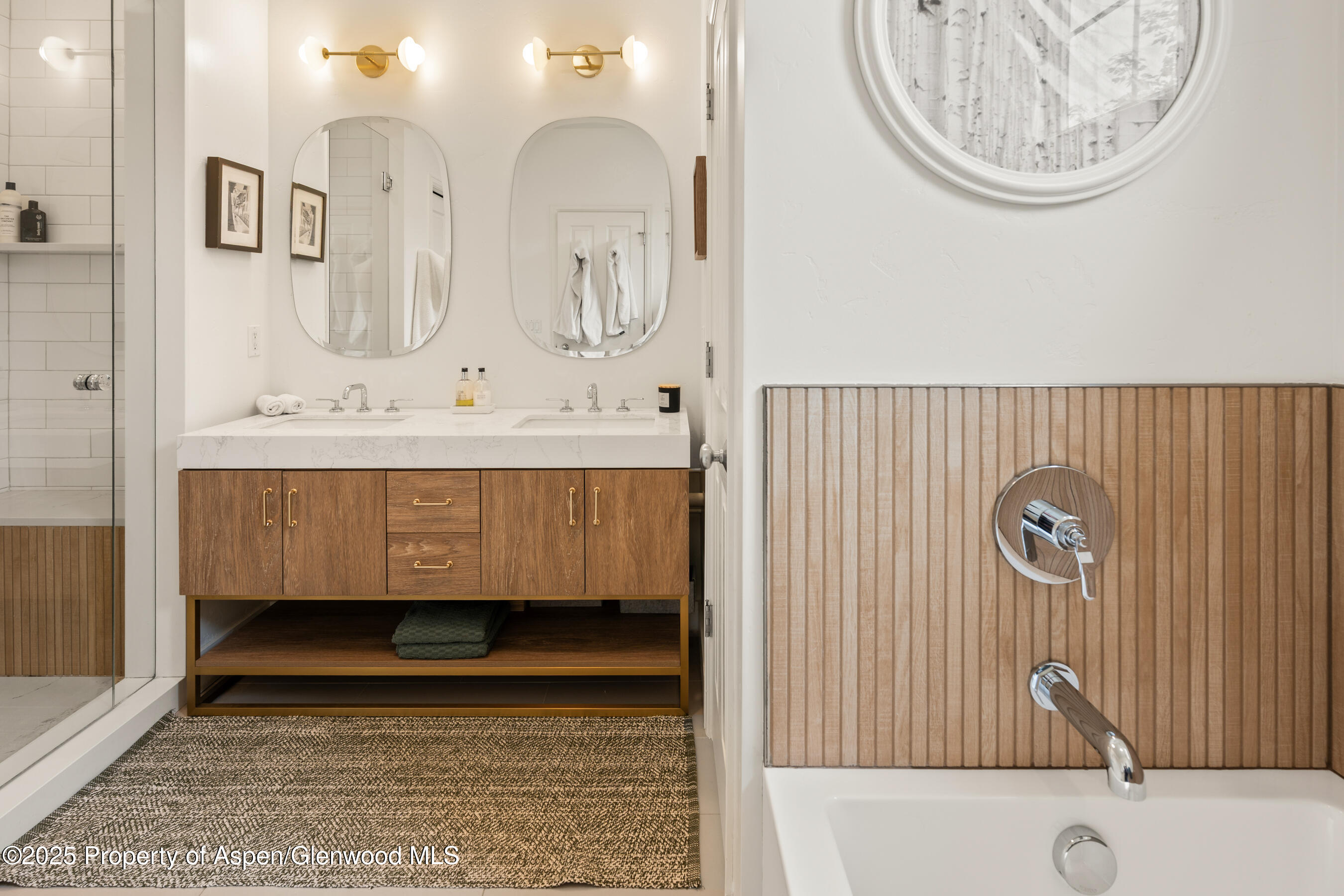 545 Evans Court Basalt, CO 81621 - Photo 8 of 25 a bathroom with a sink a mirror and a bathtub