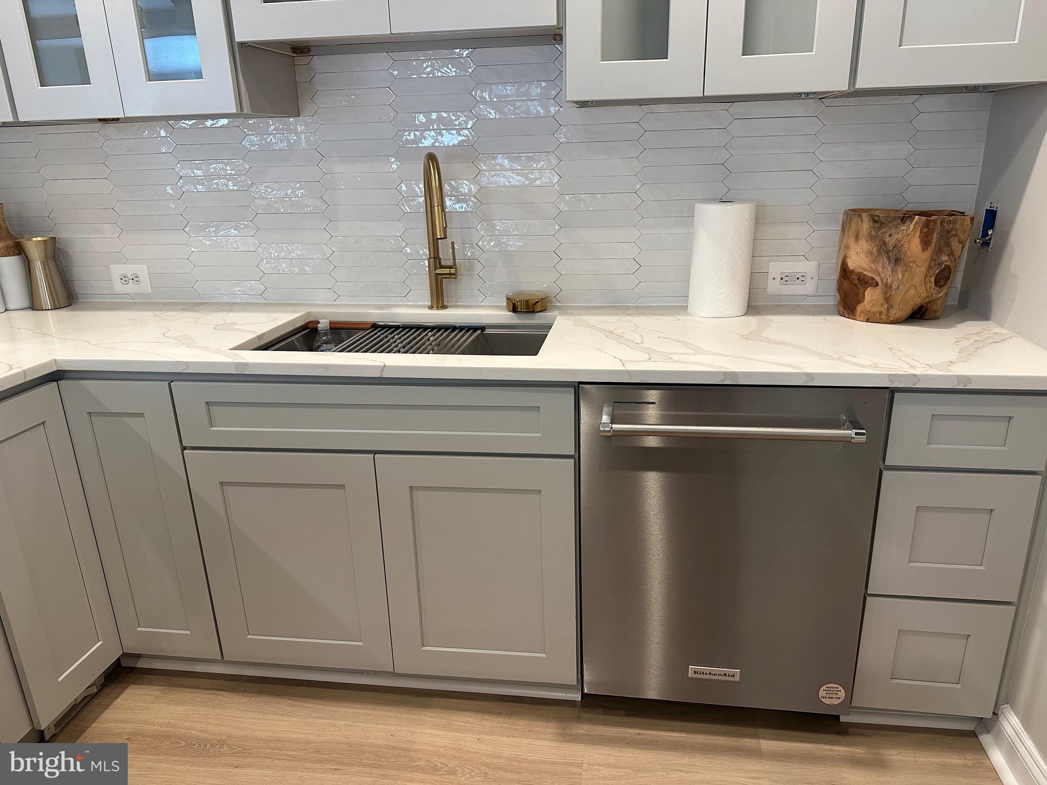 43295 Fieldsview Court Leesburg, VA 20176 - Photo 12 of 30 a sink with white cabinets