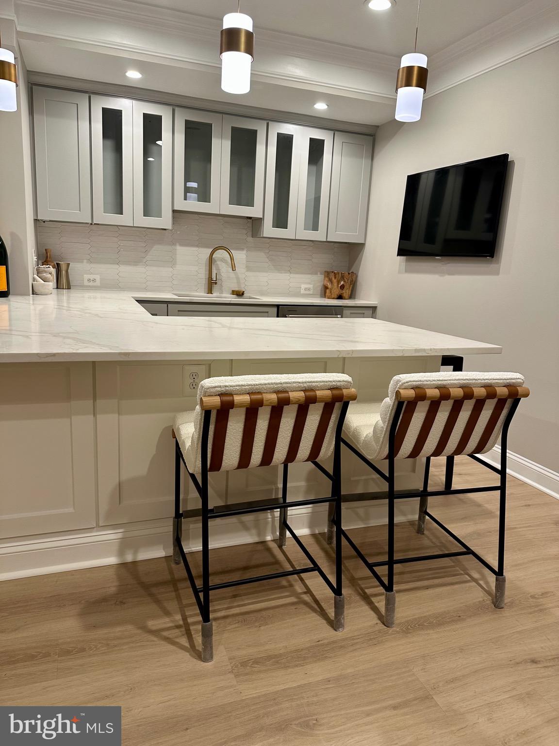 43295 Fieldsview Court Leesburg, VA 20176 - Photo 8 of 30 a living room with furniture and a flat screen tv
