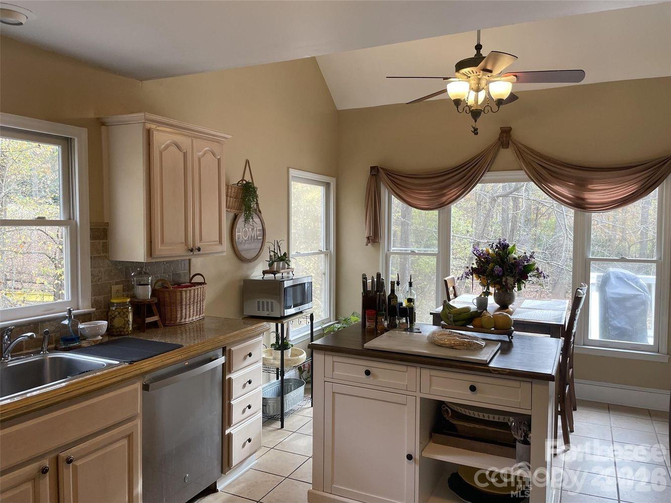 3800 Oldfield Road Charlotte, NC 28226 - Photo 7 of 32 a very nice looking room with a large window