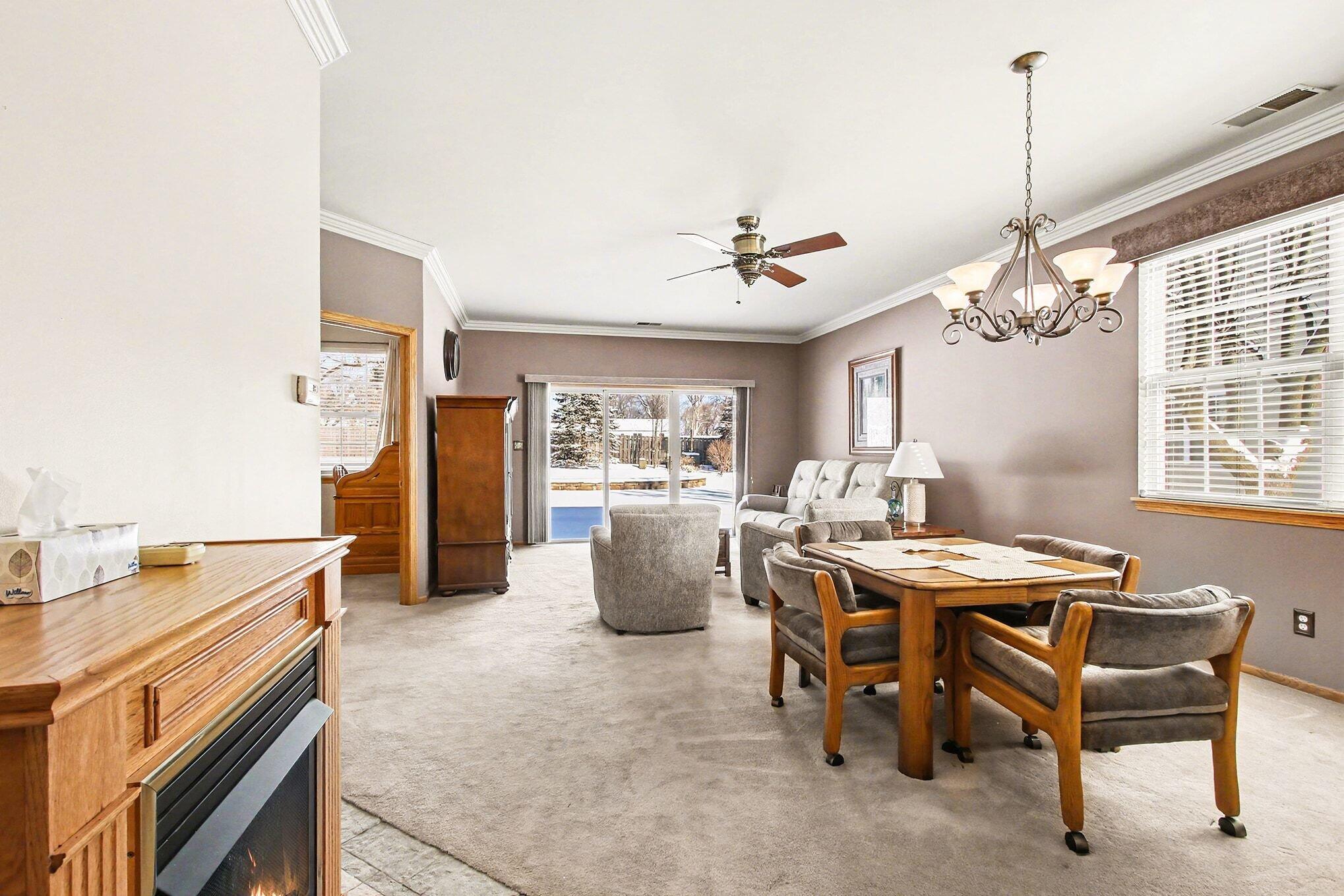 12310 80th Place Dyer, IN 46311 - Photo 12 of 37 a view of a dining room with furniture and chandelier