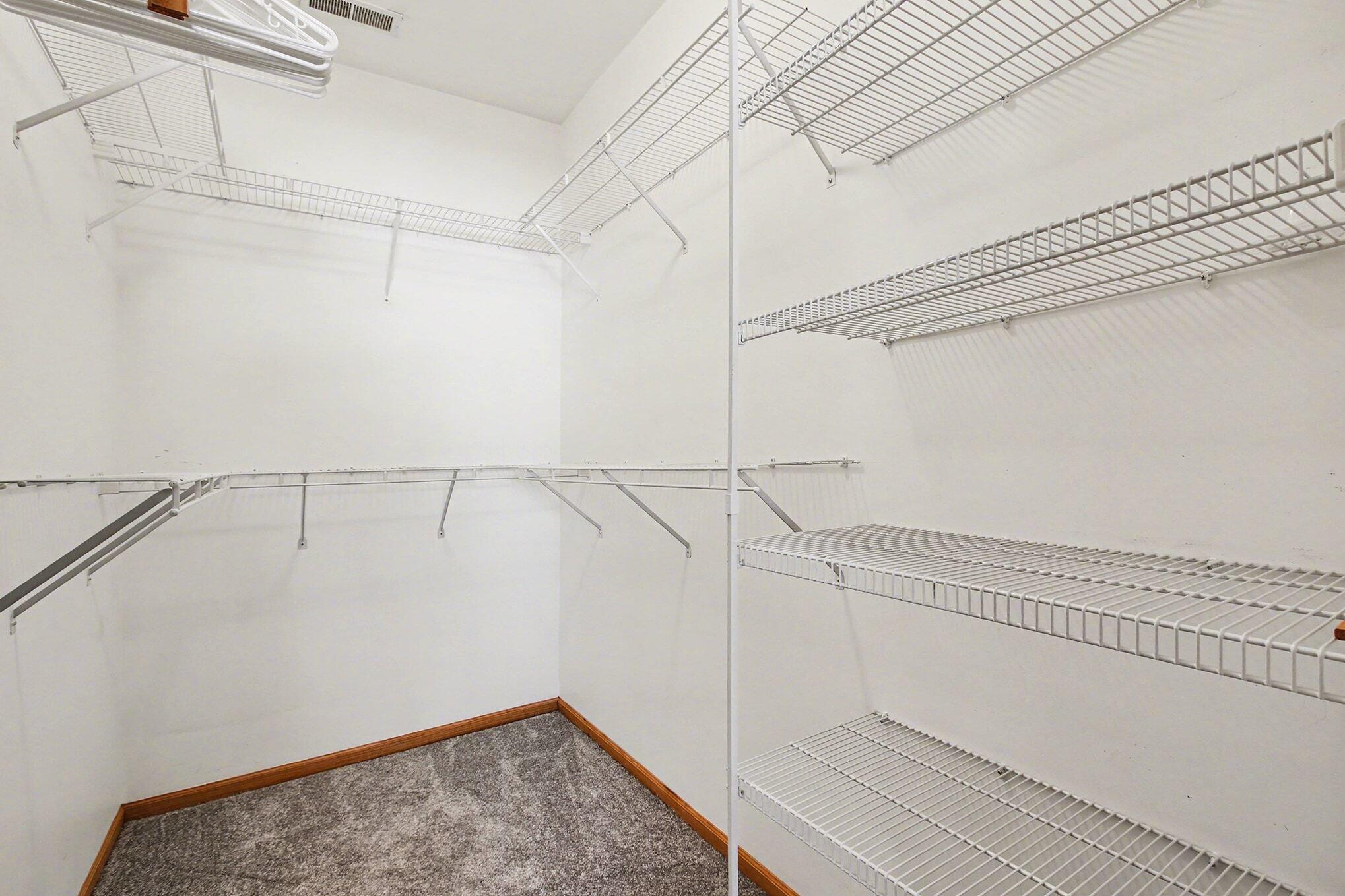 12310 80th Place Dyer, IN 46311 - Photo 19 of 37 a view of a room with racks on the wall