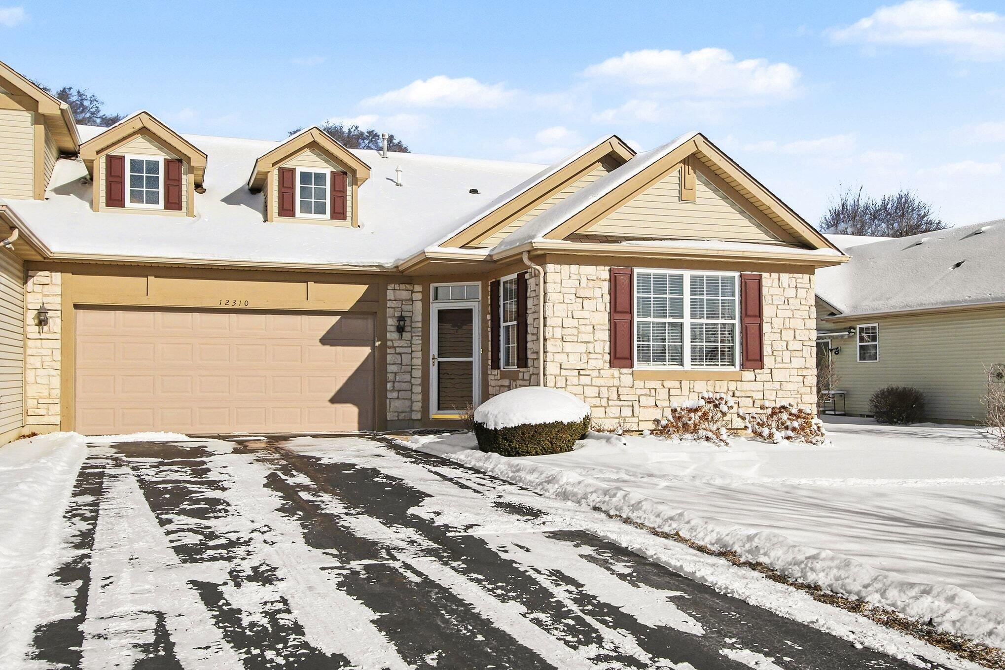 12310 80th Place Dyer, IN 46311 - Photo 2 of 37 a front view of a house with a yard