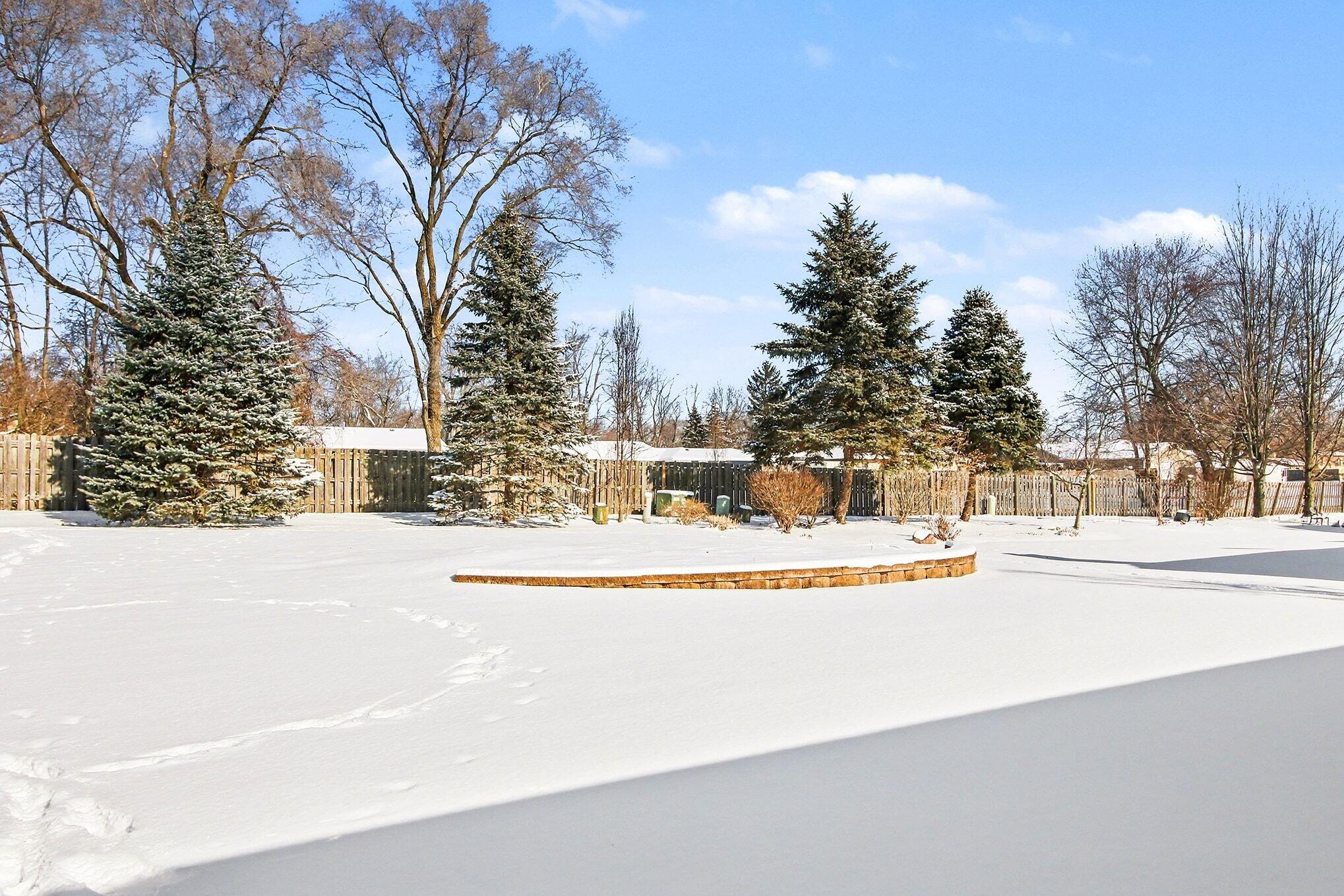 12310 80th Place Dyer, IN 46311 - Photo 25 of 37 a view of a white house with a yard