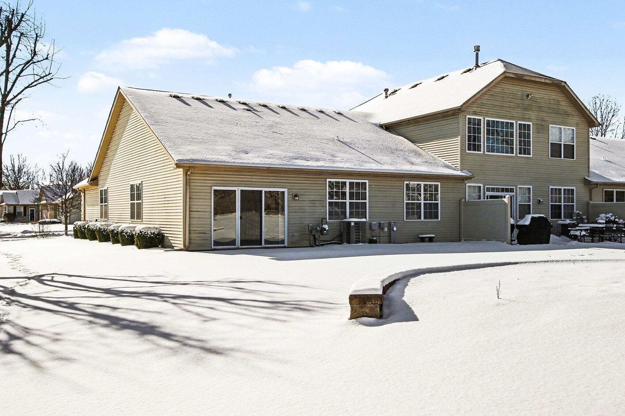 12310 80th Place Dyer, IN 46311 - Photo 26 of 37 a front view of a house with a patio