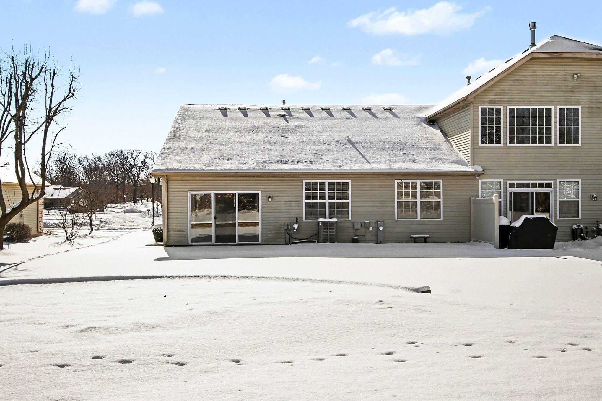 12310 80th Place Dyer, IN 46311 - Photo 27 of 37 a front view of a house with a yard