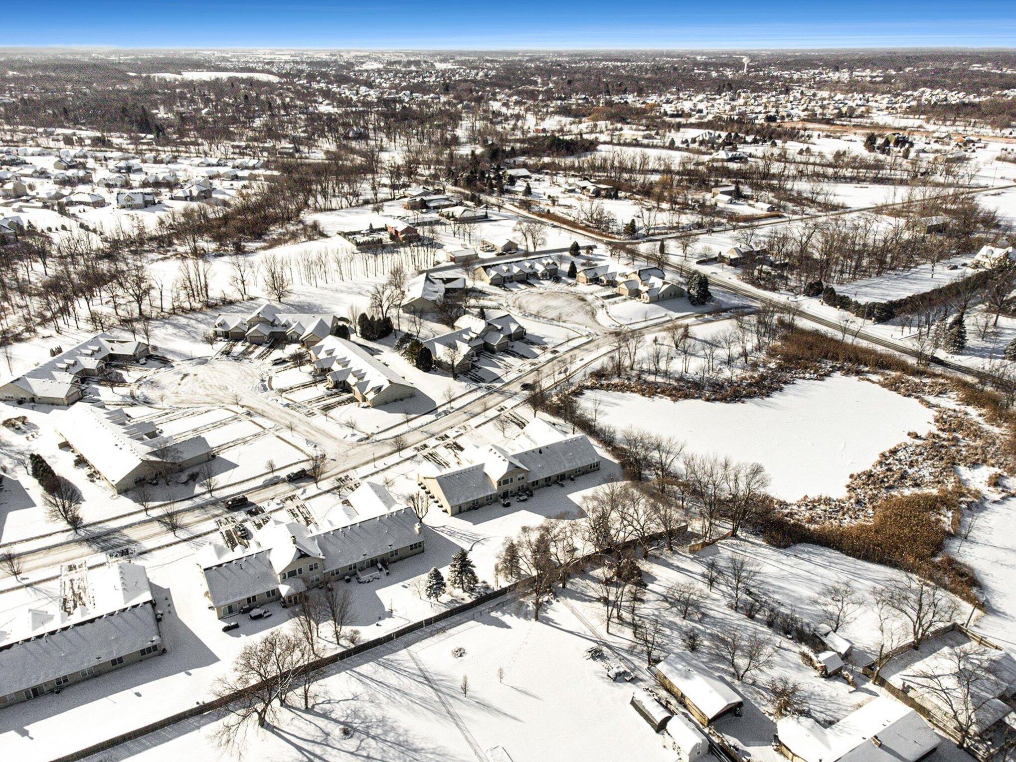 12310 80th Place Dyer, IN 46311 - Photo 31 of 37 an aerial view of residential building with parking