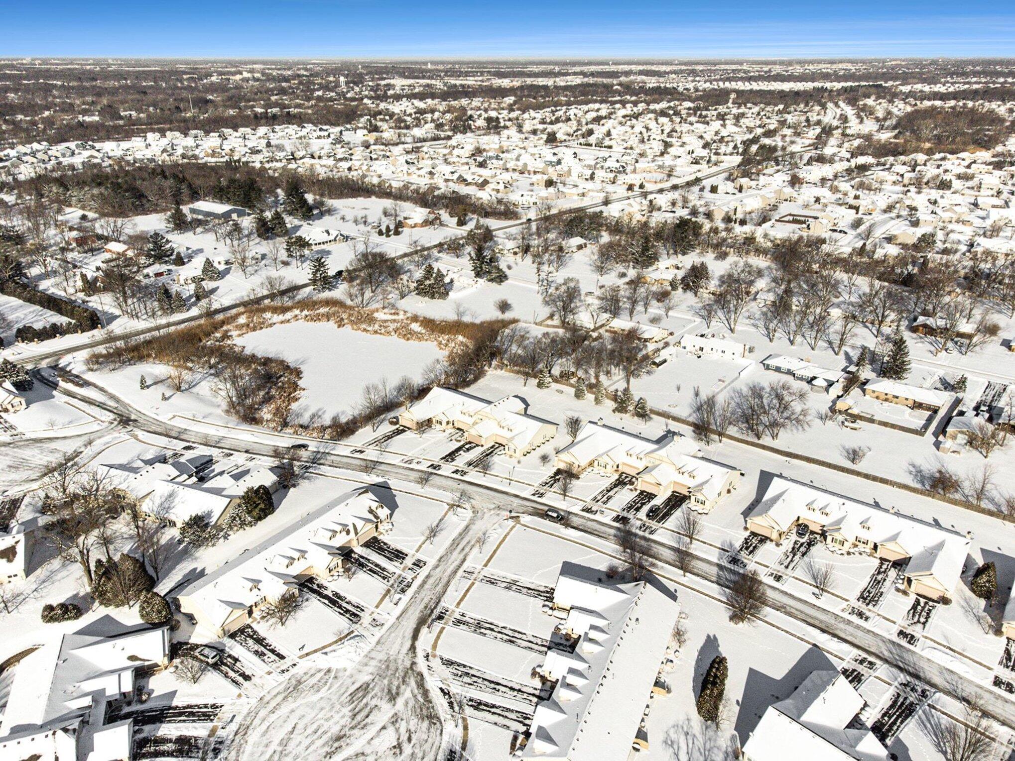 12310 80th Place Dyer, IN 46311 - Photo 32 of 37 an aerial view of residential building with parking space