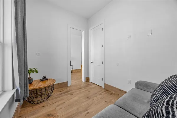 wooden floor and chair in a room