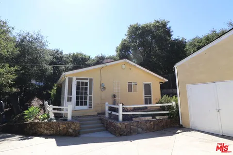 a front view of a house with entryway