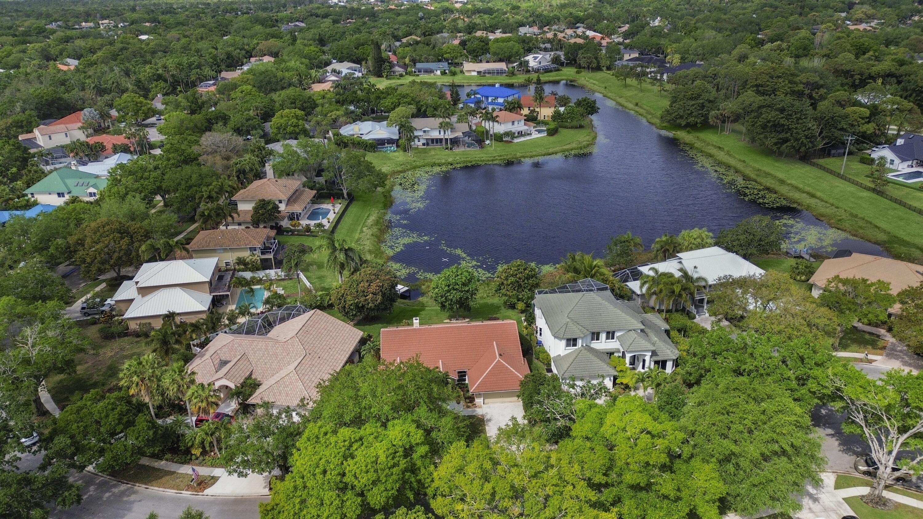 6279 Longleaf Pine Drive Jupiter, FL 33458 - Photo 23 of 33 an aerial view of a house with a garden