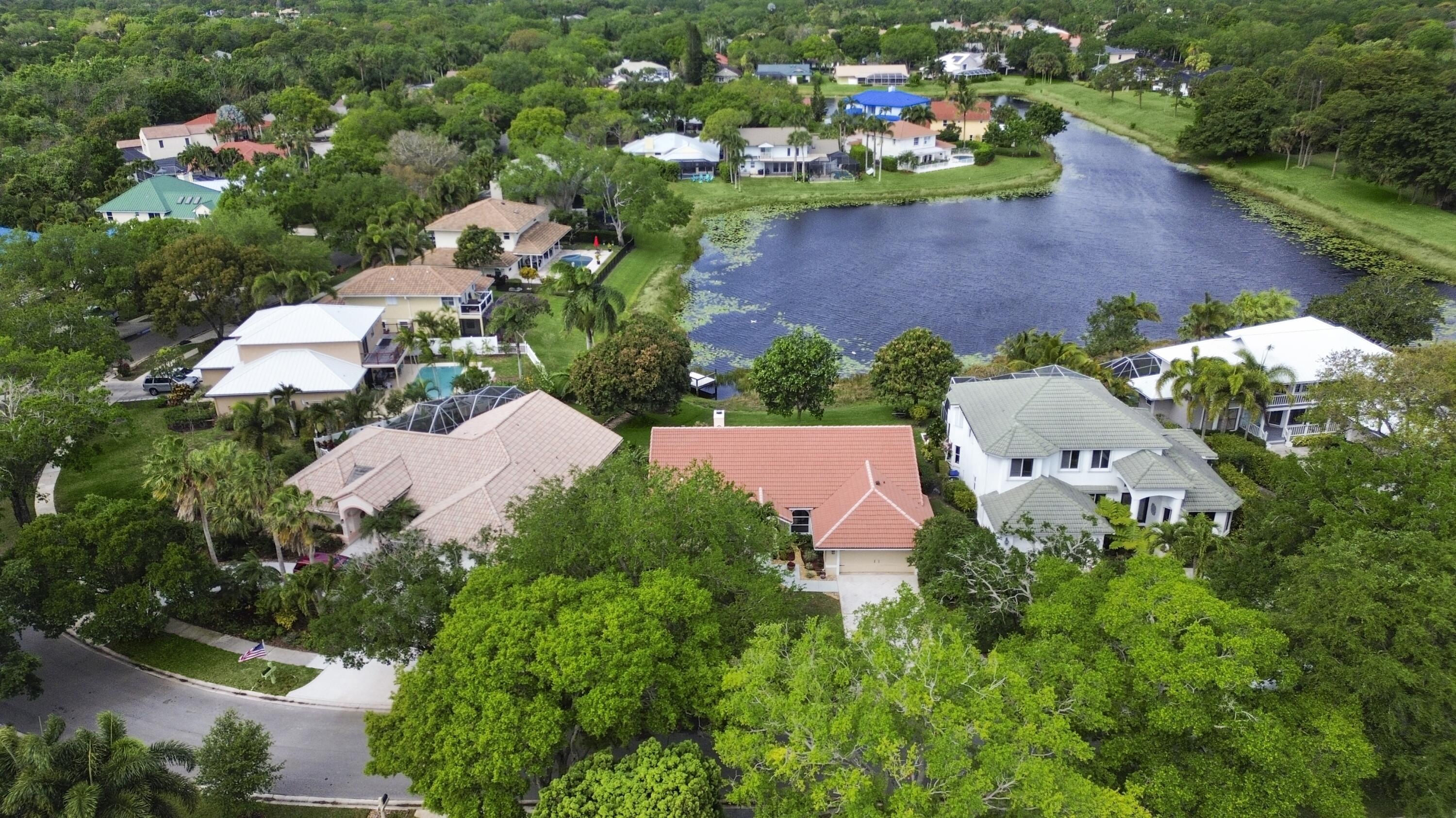 6279 Longleaf Pine Drive Jupiter, FL 33458 - Photo 24 of 33 a view of a garden with a flower in a garden