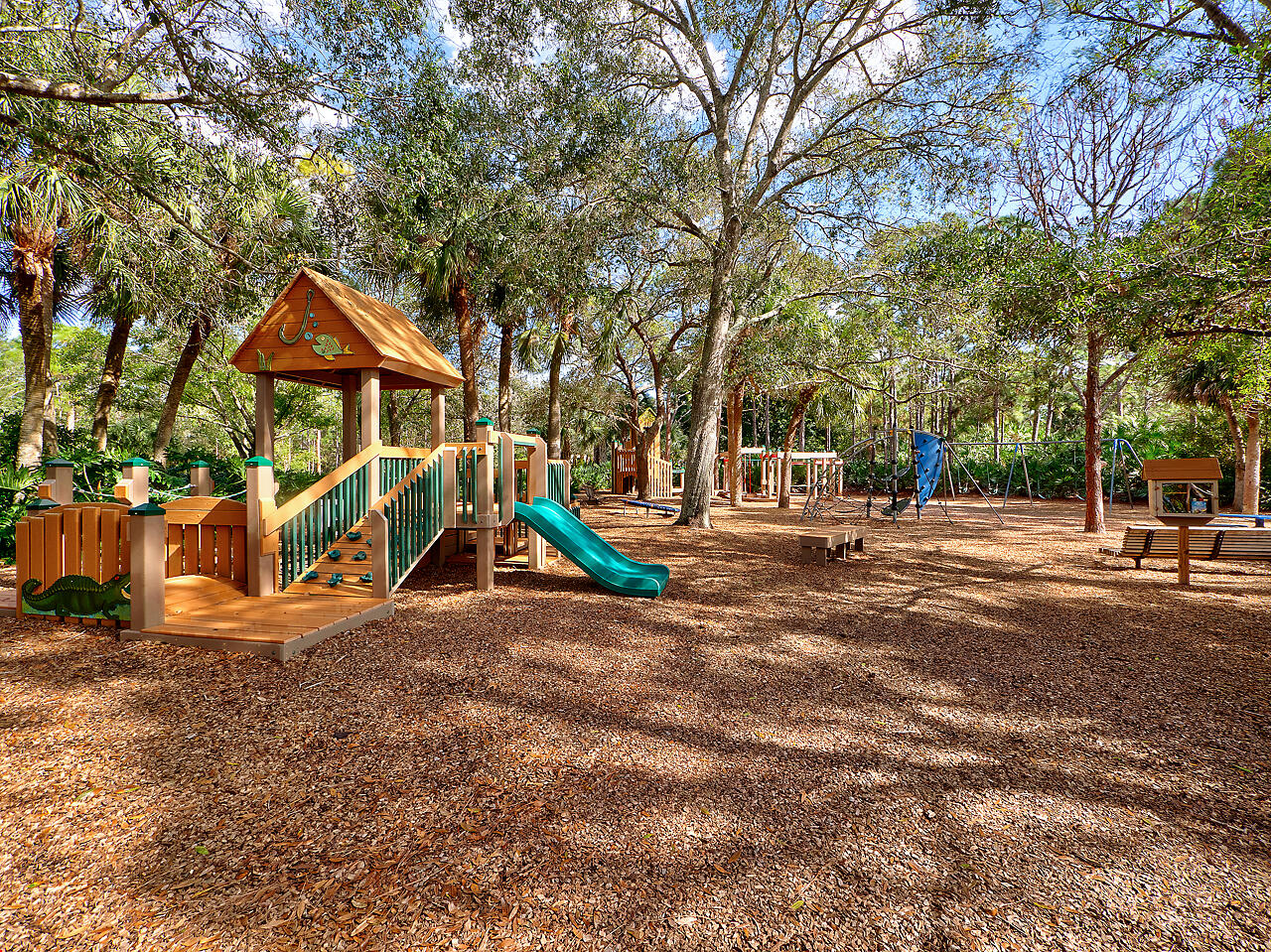 6279 Longleaf Pine Drive Jupiter, FL 33458 - Photo 26 of 33 a view of outdoor space with playground and green space