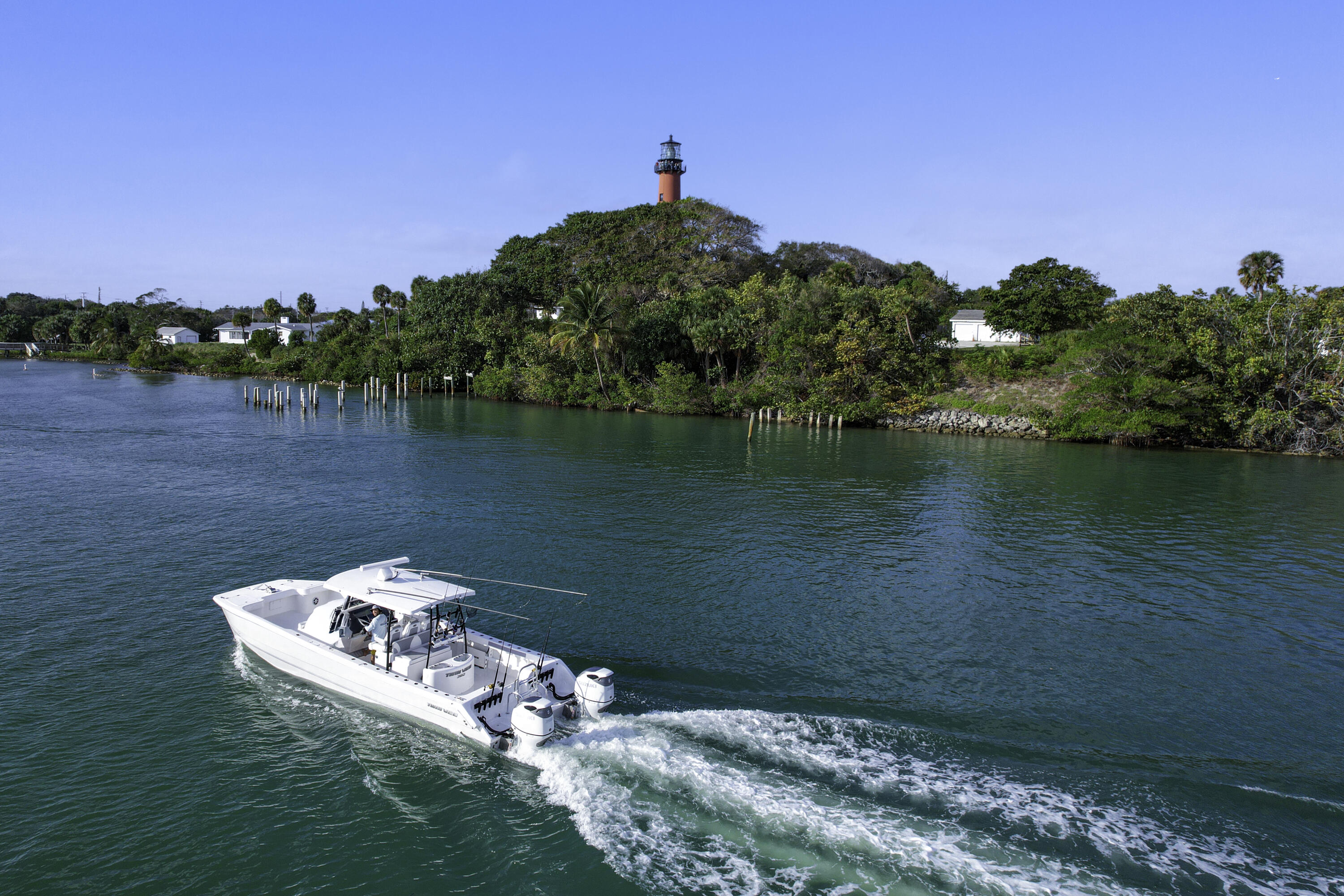 6279 Longleaf Pine Drive Jupiter, FL 33458 - Photo 31 of 33 a view of a lake with a yard