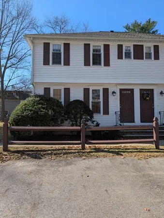 a view of a livingroom with wooden floor