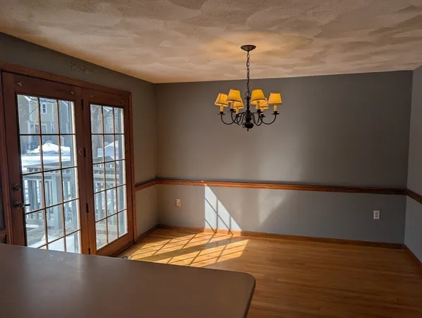 a kitchen with stainless steel appliances granite countertop a stove a sink dishwasher and a refrigerator