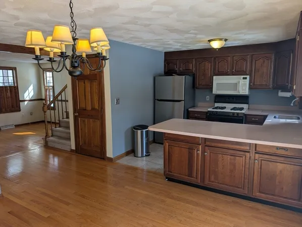a view of an empty room with closet and closet