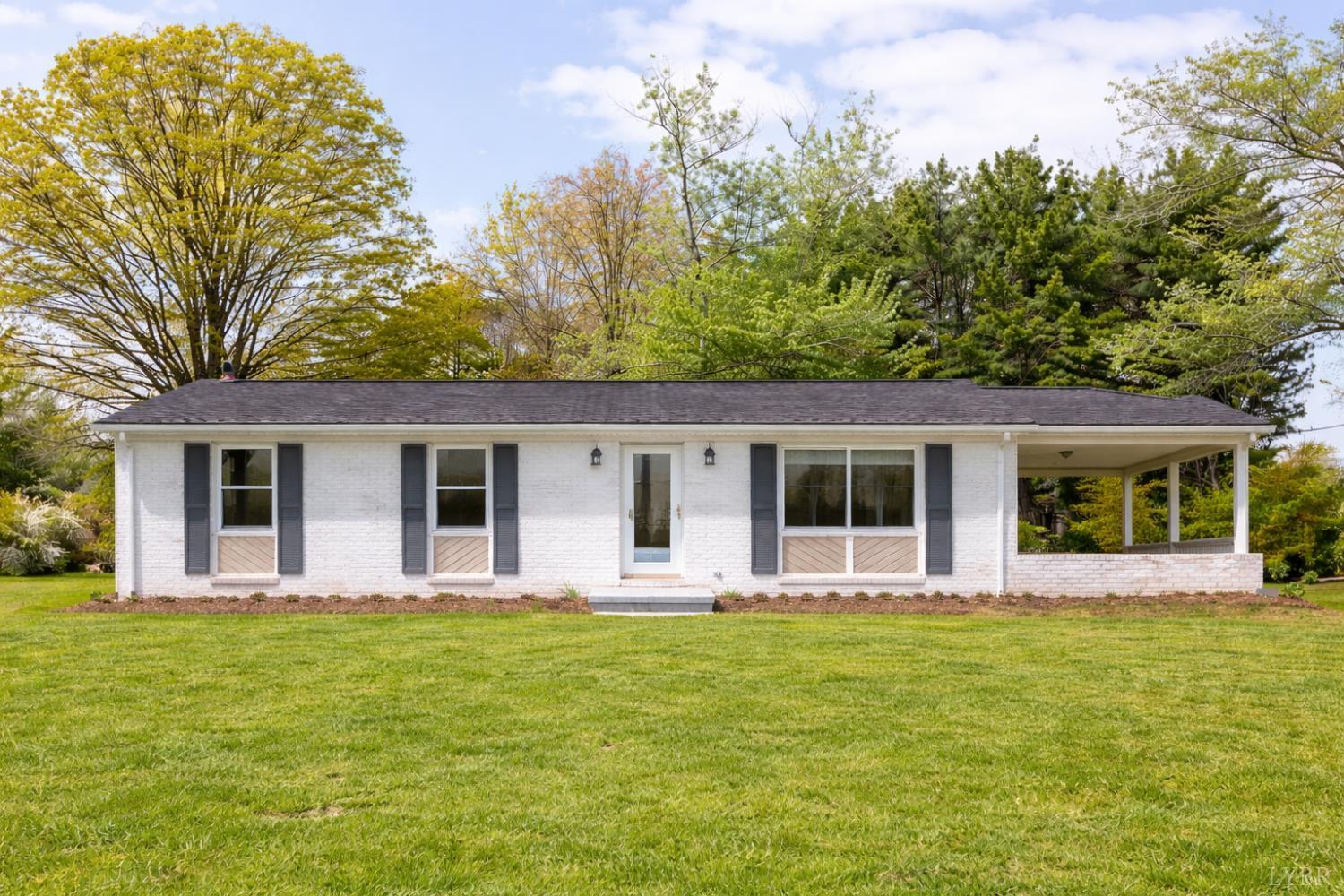 18 Witt Road Evington, VA 24550 - Photo 1 of 43 a front view of house with yard and green space