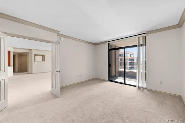 a large kitchen with kitchen island a sink stainless steel appliances and a sink