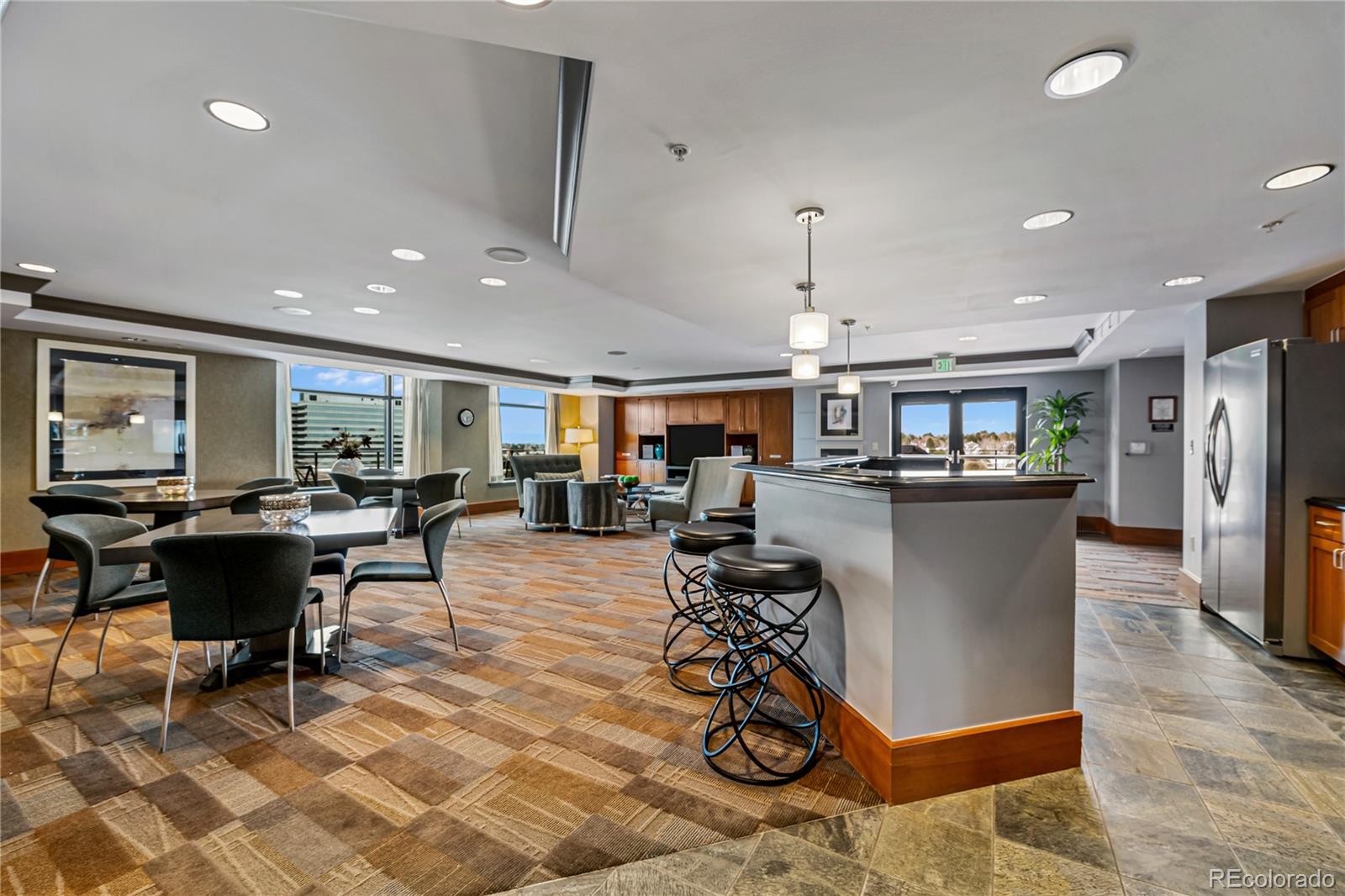 8100 East Union Avenue, Unit 814 Denver, CO 80237 - Photo 32 of 38 a view of a dining room with furniture