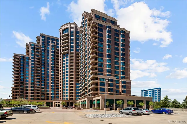 a front view of a building with a street
