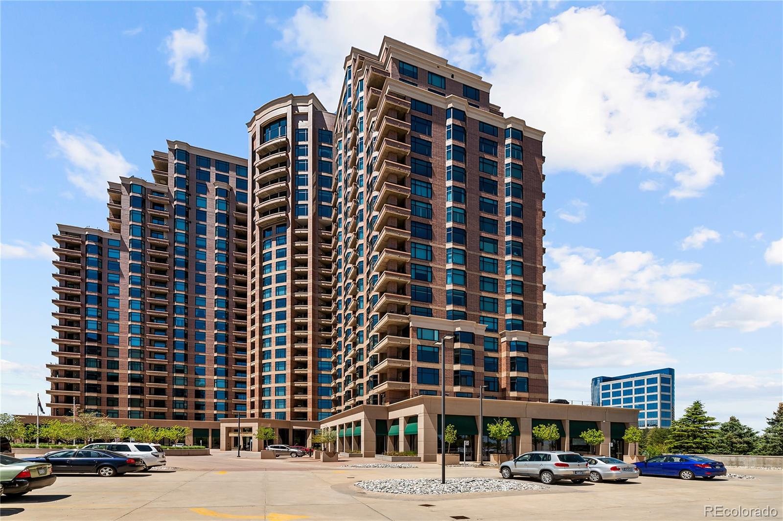 8100 East Union Avenue, Unit 814 Denver, CO 80237 - Photo 4 of 38 a front view of a building with a street