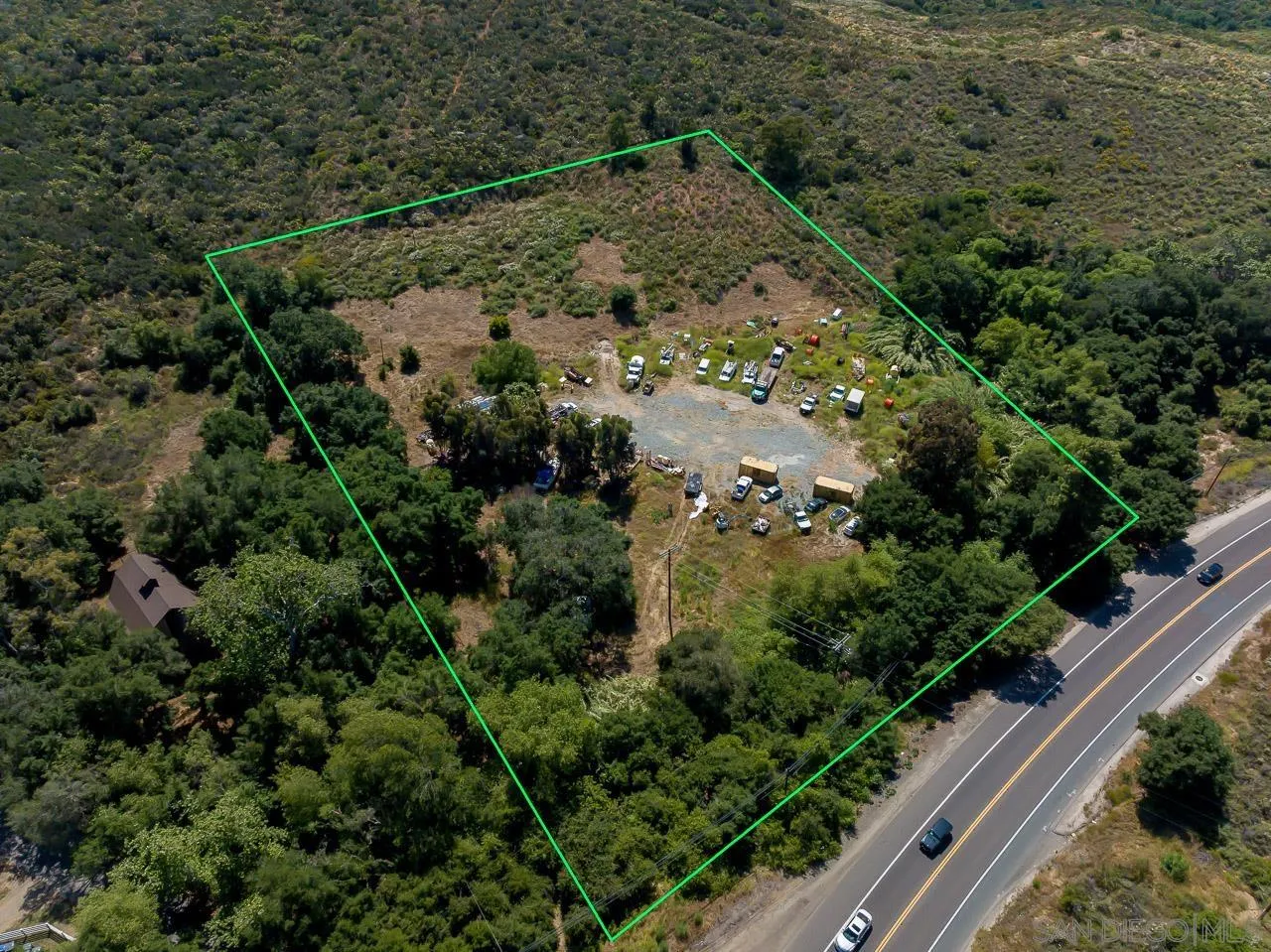 13455 Campo Road, Unit 5960314300 Jamul, CA 91935 - Photo 1 of 10 a view of a yard with plants and large trees