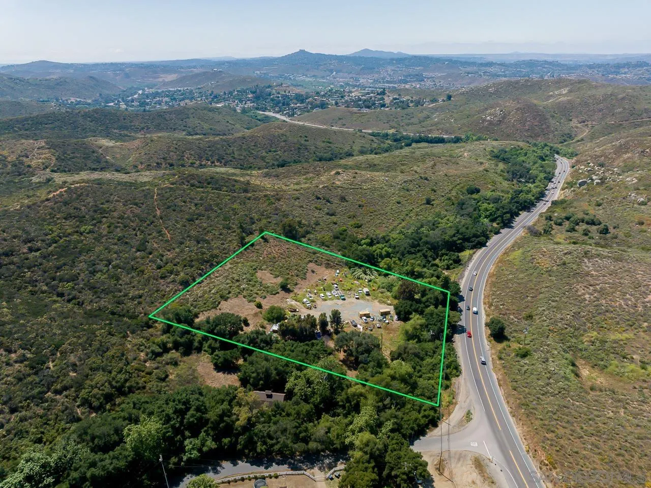 13455 Campo Road, Unit 5960314300 Jamul, CA 91935 - Photo 9 of 10 an aerial view of a house with a yard