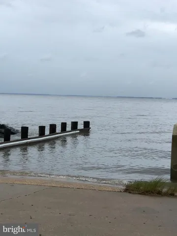 a view of a living room with stainless steel appliances