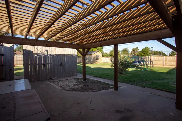 a view of backyard with green space