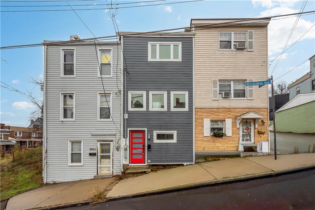 807 McCandless Avenue Pittsburgh, PA 15201 - Photo 1 of 24 a front view of a house with a garage