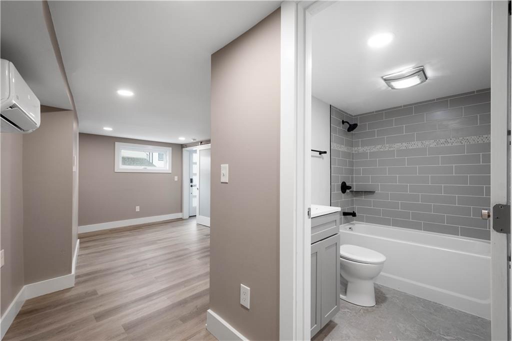807 McCandless Avenue Pittsburgh, PA 15201 - Photo 17 of 24 a bathroom with a toilet a sink and bathtub
