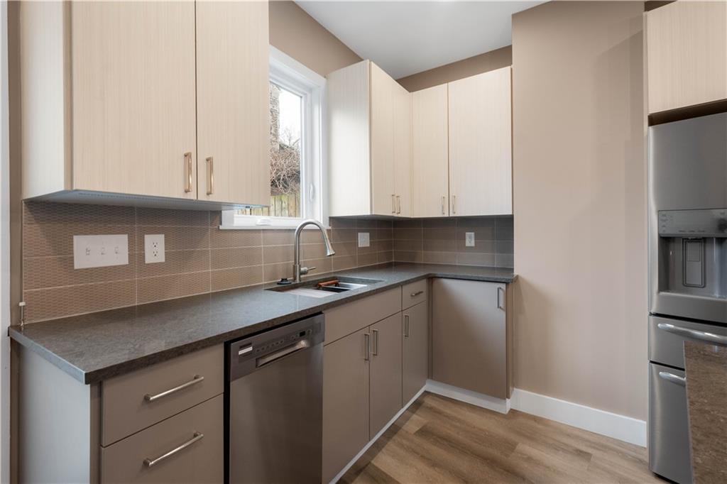 807 McCandless Avenue Pittsburgh, PA 15201 - Photo 5 of 24 a kitchen with a sink cabinets and appliances