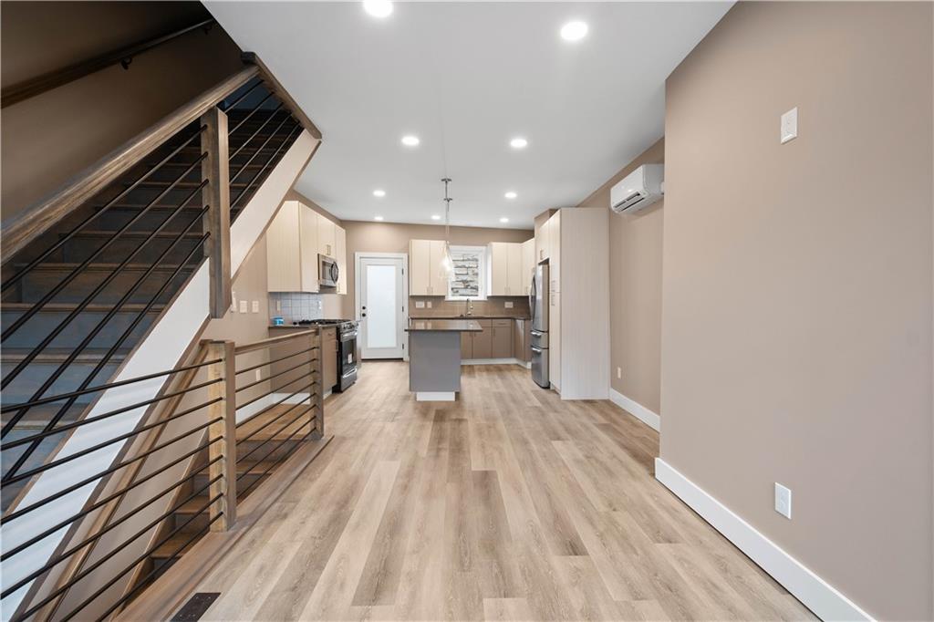 807 McCandless Avenue Pittsburgh, PA 15201 - Photo 8 of 24 a view of a kitchen with wooden floor