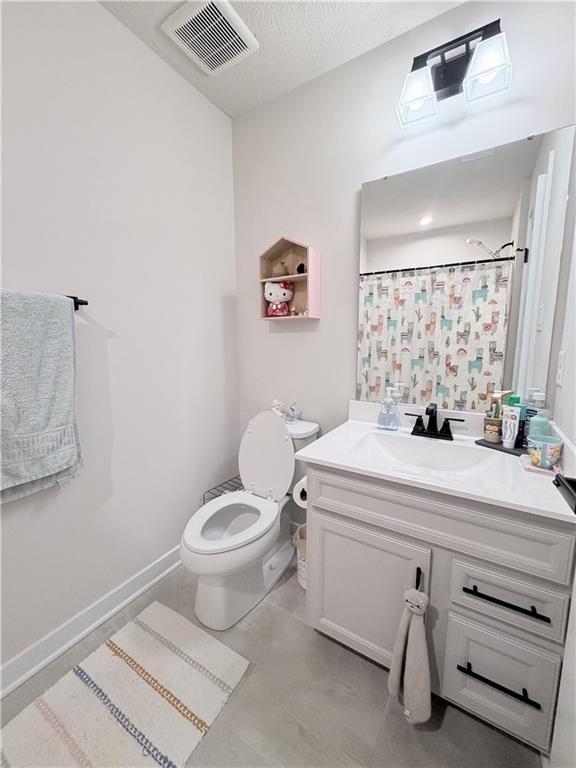 120 Crown Street McKees Rocks, PA 15136 - Photo 13 of 28 a bathroom with a sink mirror vanity and toilet