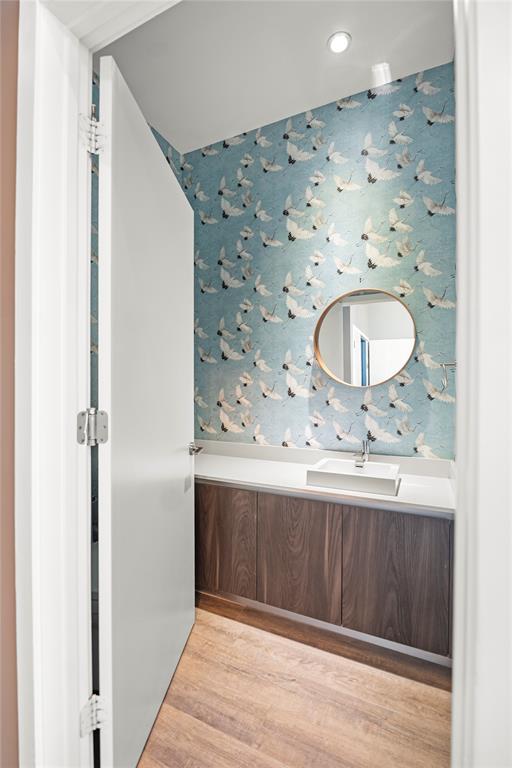 480 Northeast 31st Street, Unit 5104A Miami, FL 33137 - Photo 22 of 26 a bathroom with a sink and a mirror