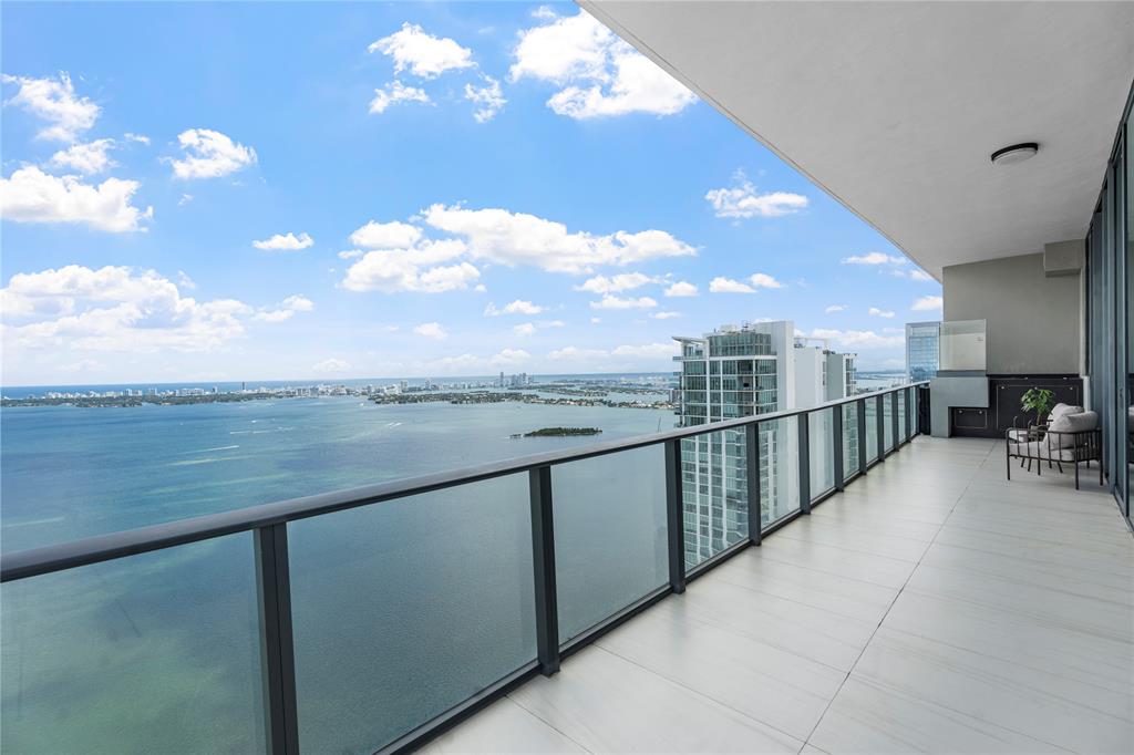 480 Northeast 31st Street, Unit 5104A Miami, FL 33137 - Photo 24 of 26 a view of swimming pool with outdoor seating