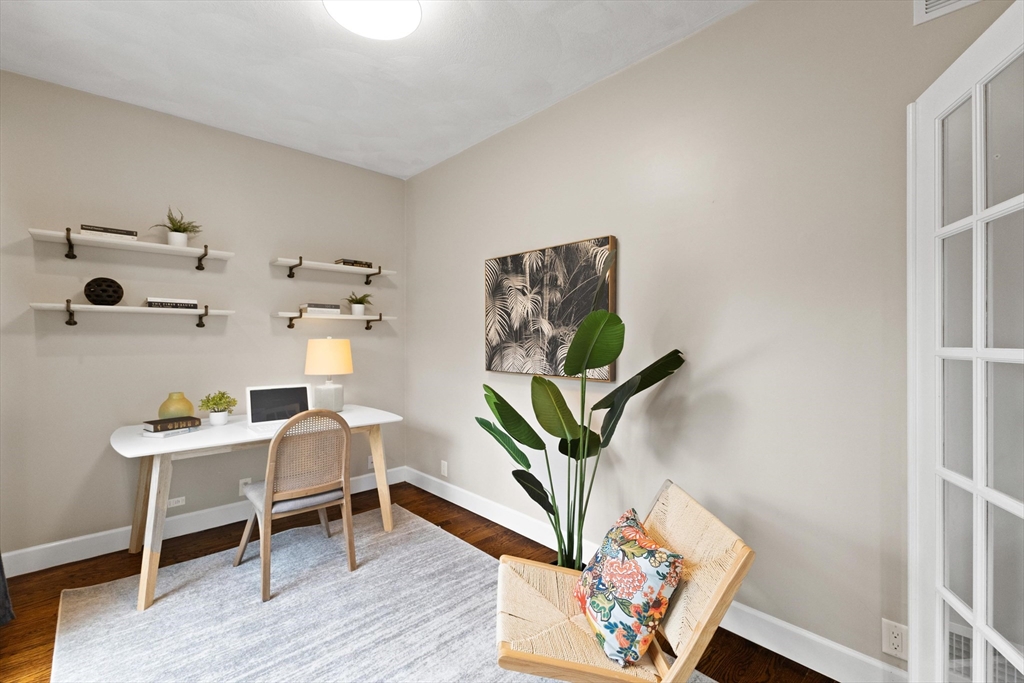58 Mansfield Road Lynnfield, MA 01940 - Photo 15 of 42 a living room with furniture and a wooden floor