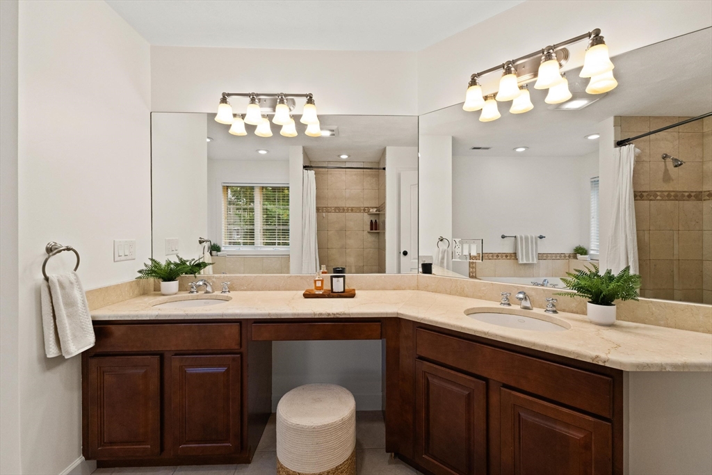 58 Mansfield Road Lynnfield, MA 01940 - Photo 23 of 42 a bathroom with a sink double vanity and a mirror