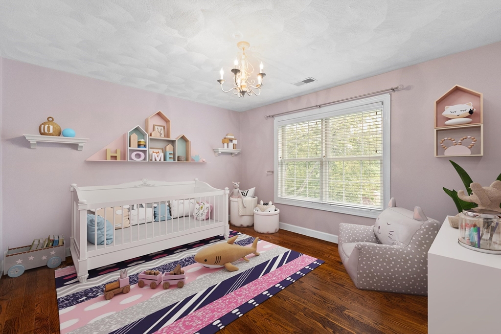 58 Mansfield Road Lynnfield, MA 01940 - Photo 24 of 42 a bedroom with furniture and a window