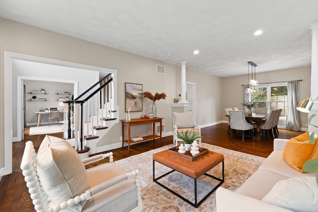 58 Mansfield Road Lynnfield, MA 01940 - Photo 5 of 42 a living room with furniture and a table