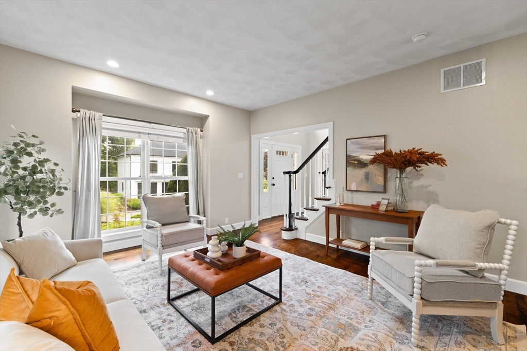 58 Mansfield Road Lynnfield, MA 01940 - Photo 6 of 42 a living room with furniture and wooden floor