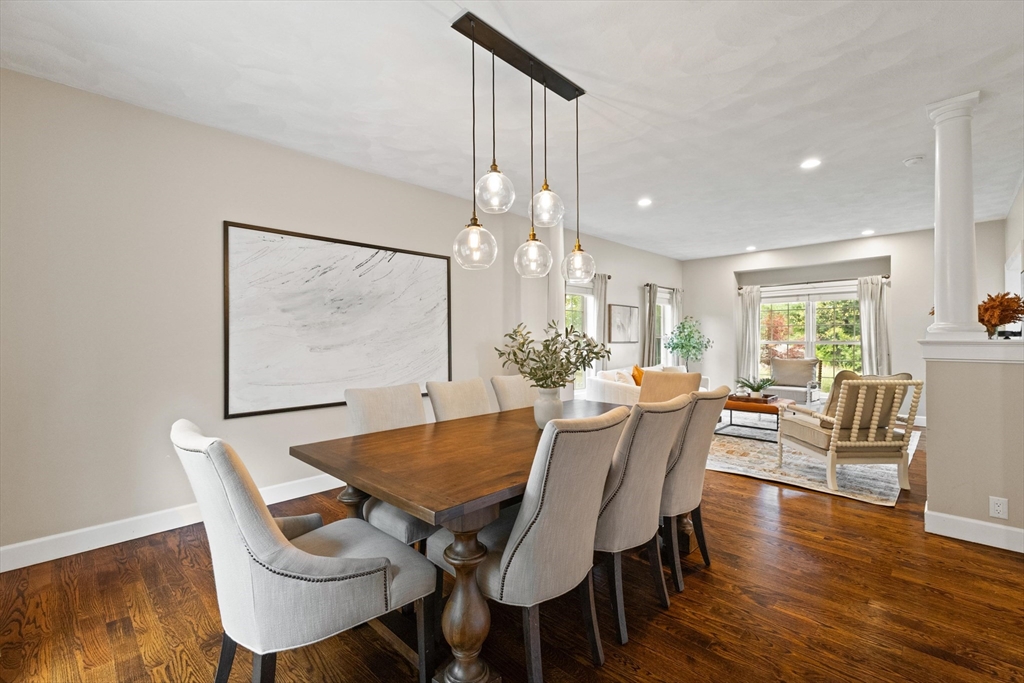 58 Mansfield Road Lynnfield, MA 01940 - Photo 7 of 42 a view of a dining room with furniture and wooden floor