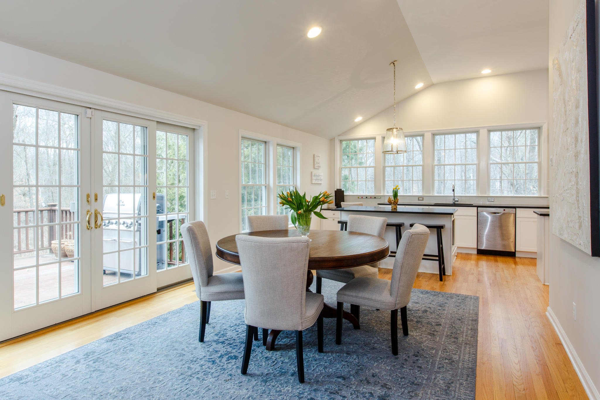54 Rocky Brook Road New Canaan, CT 06840 - Photo 11 of 25 a view of a dining room with furniture and wooden floor